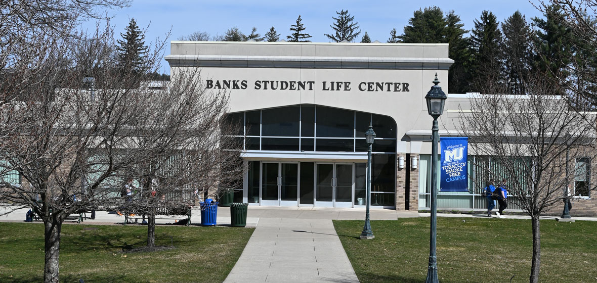 Banks student life center in an early spring, bare trees